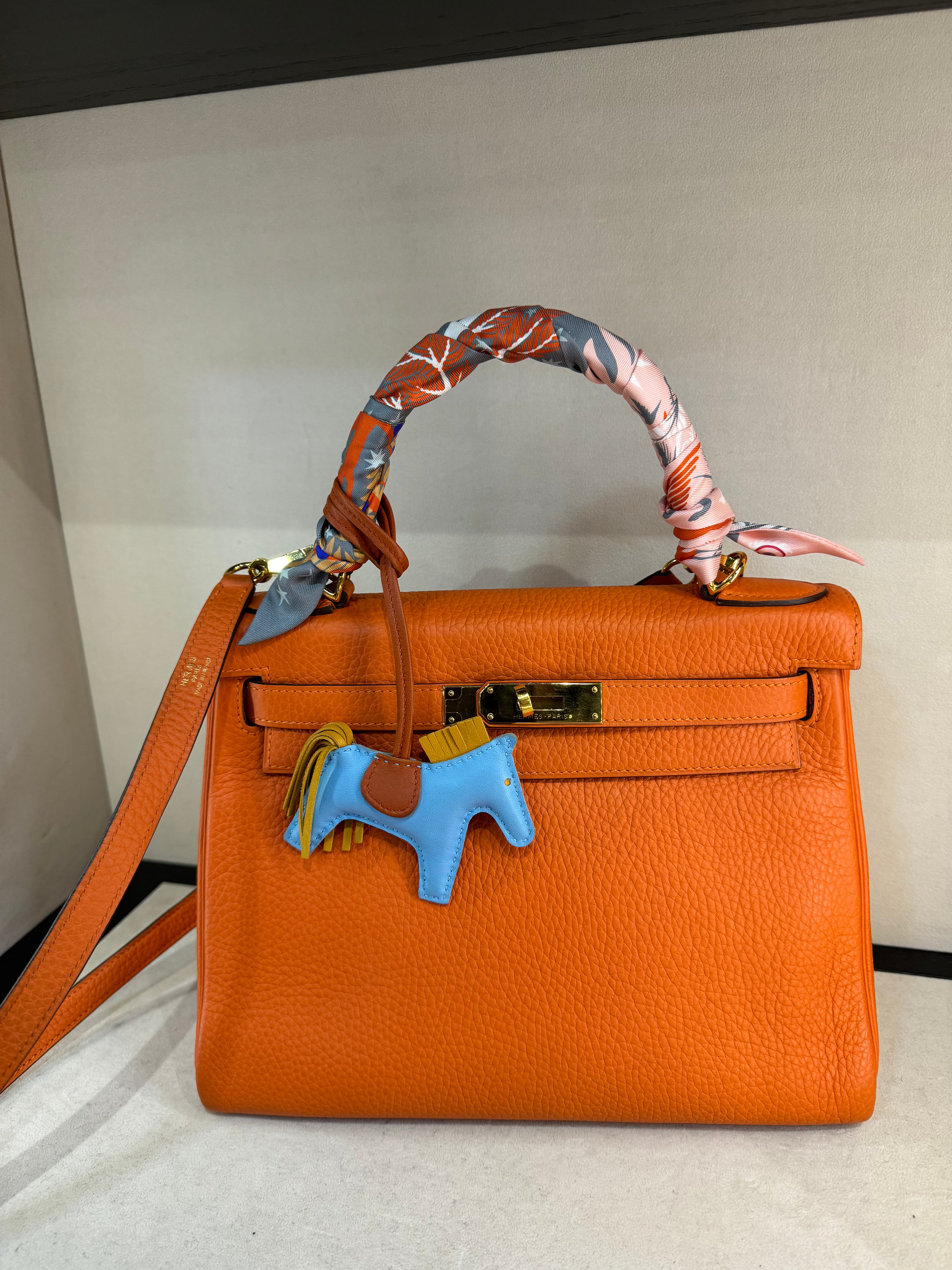 Hermes Kelly 28 orange gold hardware handbag
